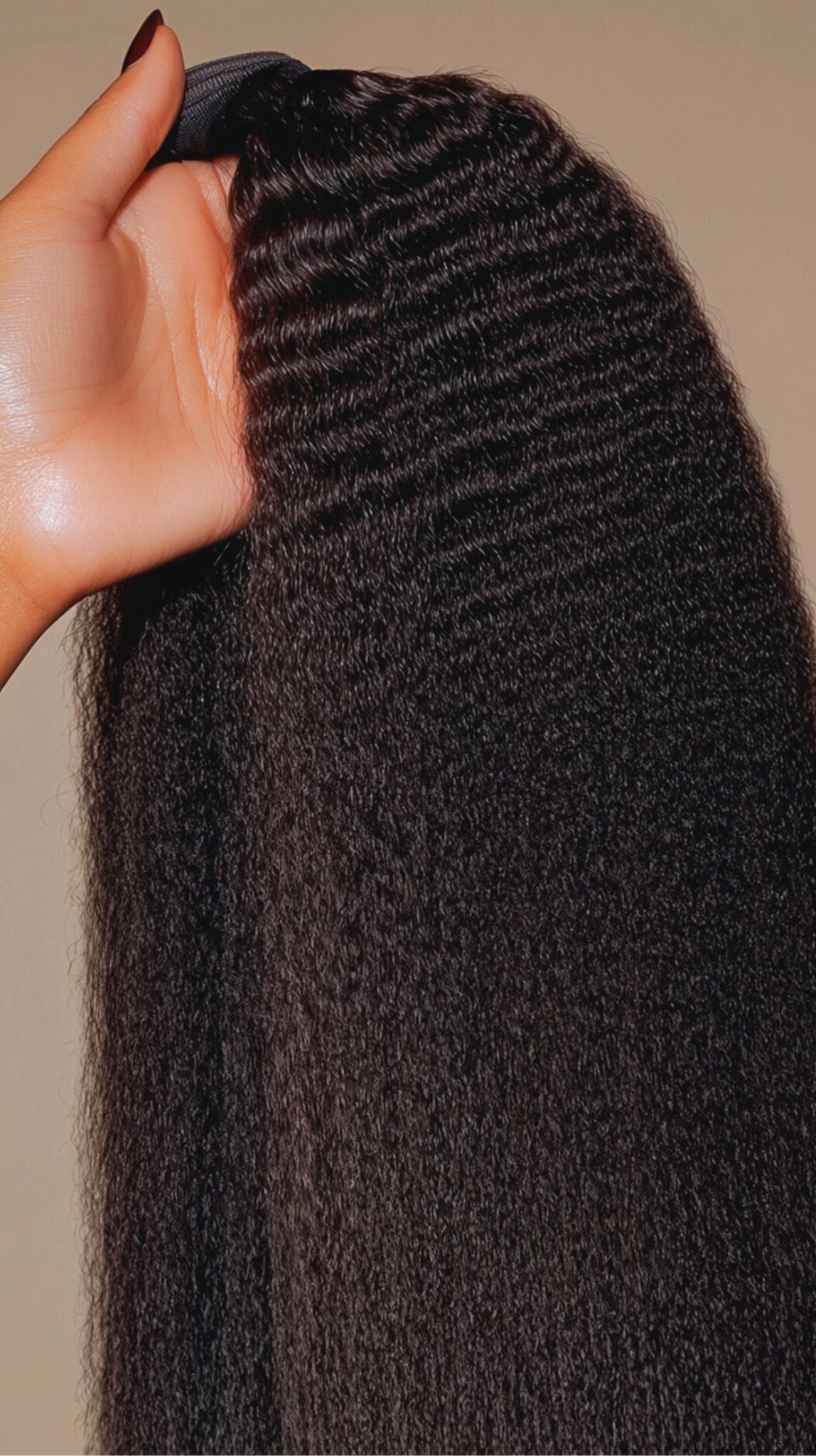 Flat display of Raw Indonesian Kinky Straight hair, highlighting its thick, natural texture and authentic raw hair quality.